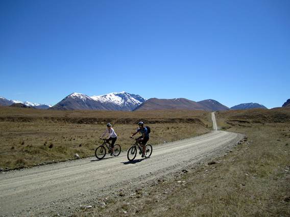 Two cyclists on the station to station trail at Walter Peak High Country Farm