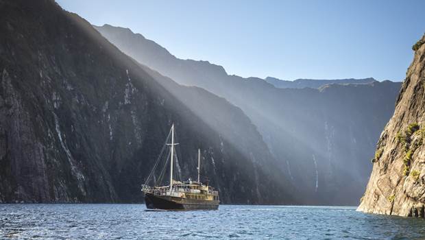 Milford Wander, traditional-style skow, sailing through Milford Sound