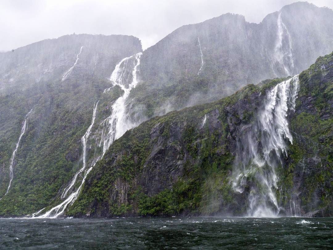 Waterfalls in the rain in Milford Sound
