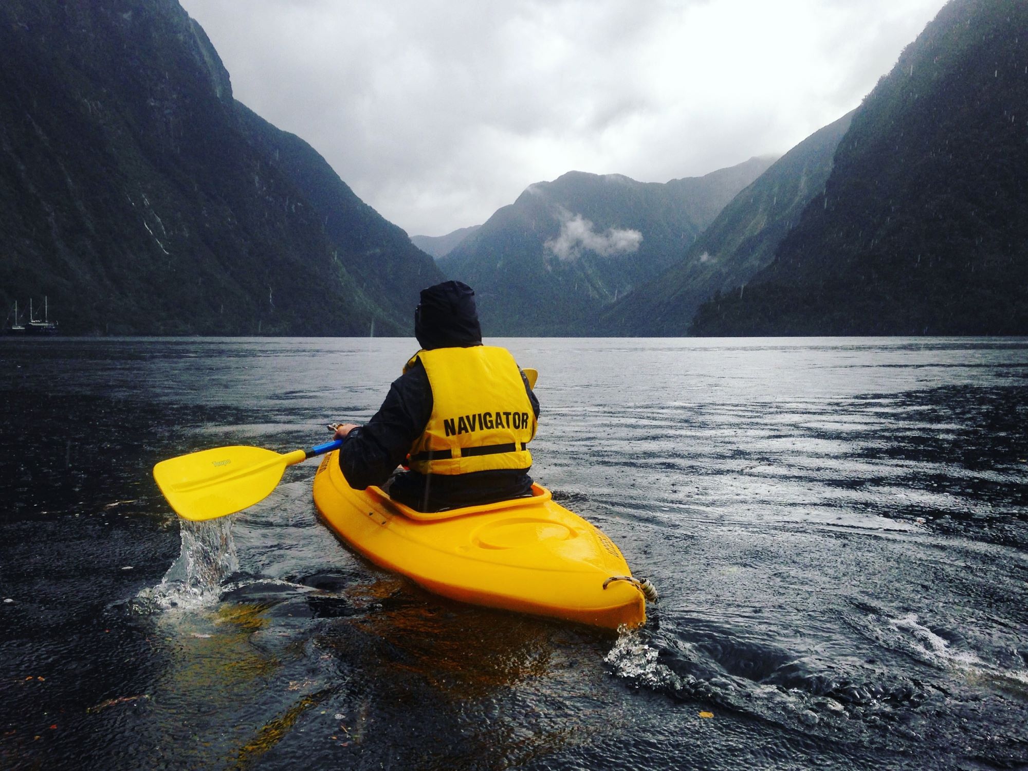 Person kayaking on Doubtful Sound