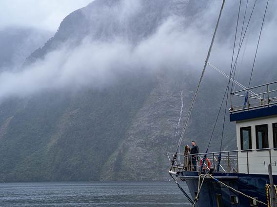 Couple enjoying the view in Doubtful Sound