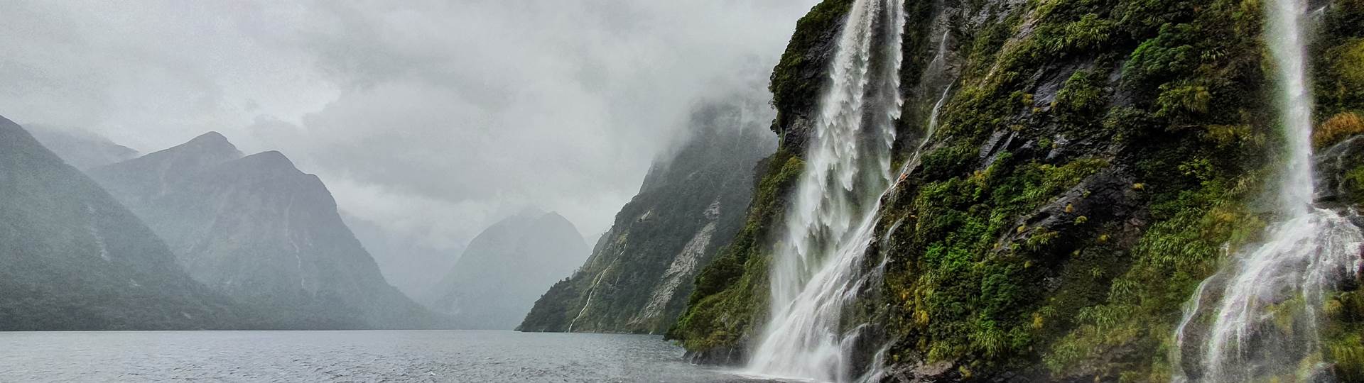 Waterfalls in a moody Doubtful Sound