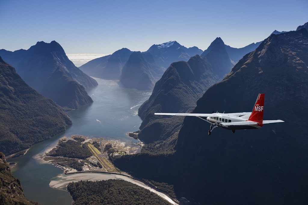 Plane approaching runway in Milford Sound
