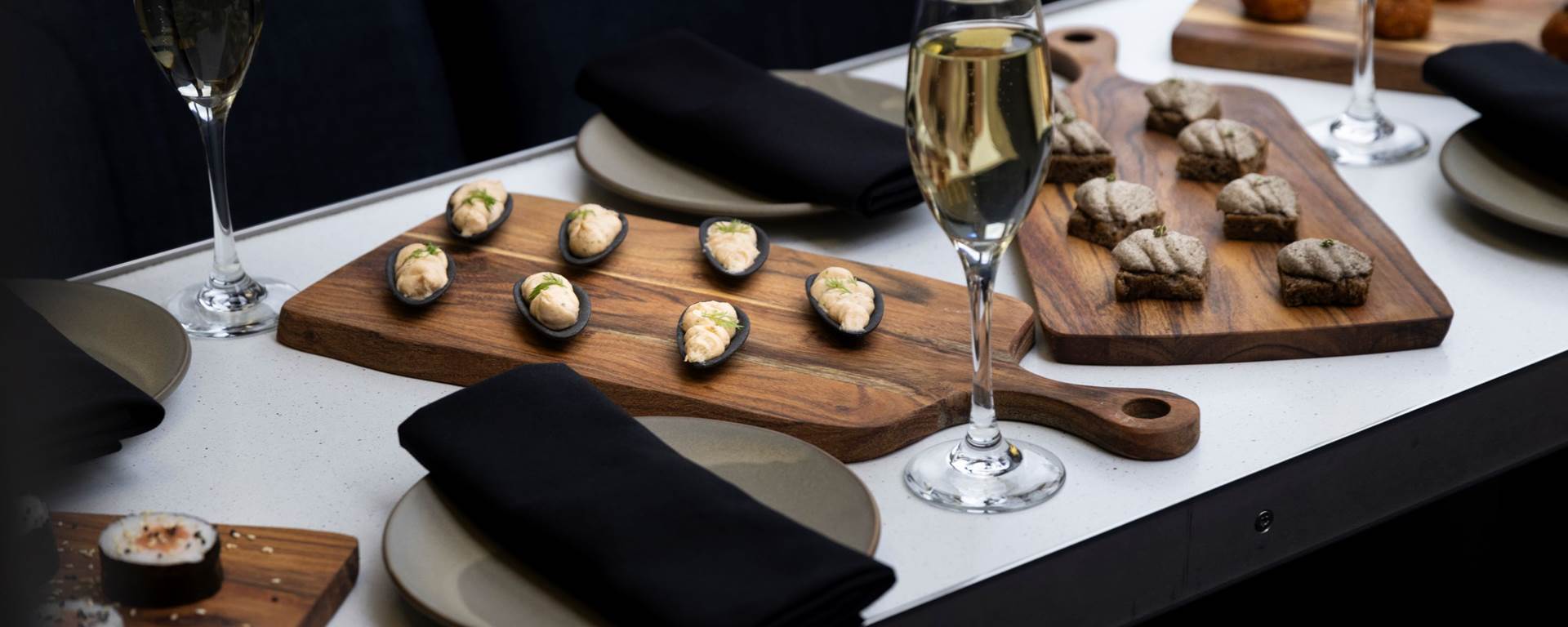 A table of canapes and champagne glasses