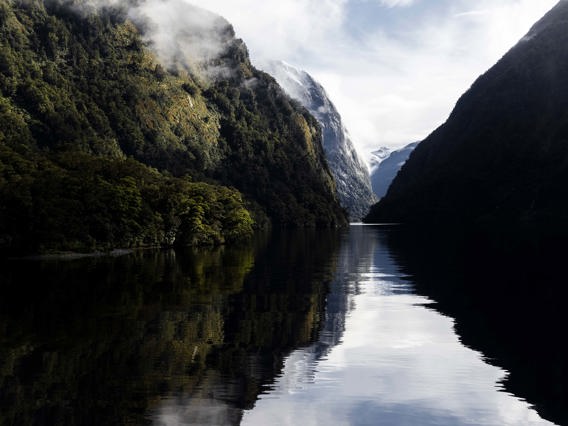 Mirror reflections of Doubtful Sound in the water