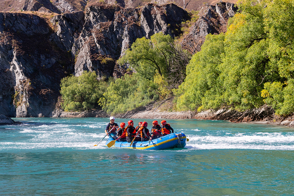 A raft paddling down the Kawarau River