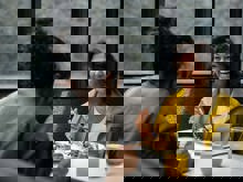 A couple enjoy a sit down lunch onboard their Milford Sound cruise 