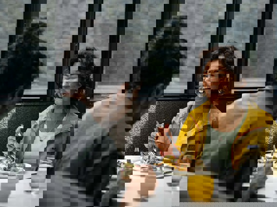 A couple enjoy a sit down lunch onboard their Milford Sound cruise 