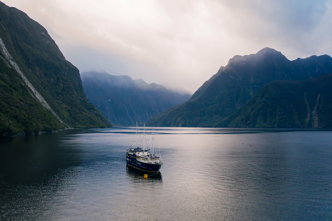 Overnight boat docked for the night in Milford Sound