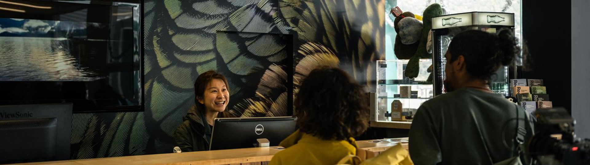 couple approaching desk of contact centre