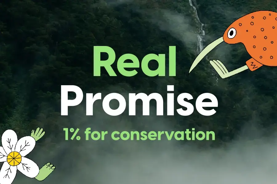 Misty mountain landscape with text: “Real Promise – 1% for conservation.