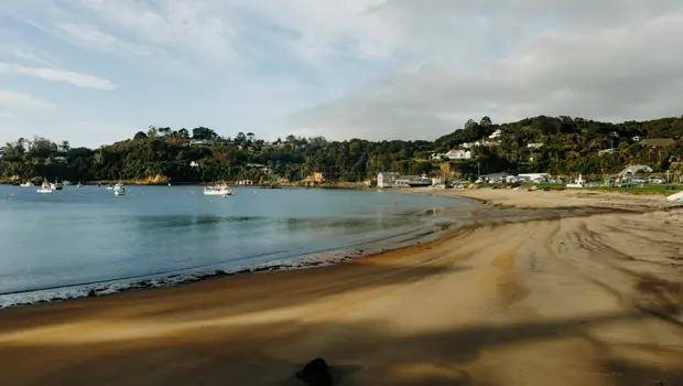 Sheltered beach and boats in the coastal settlement of Oban.